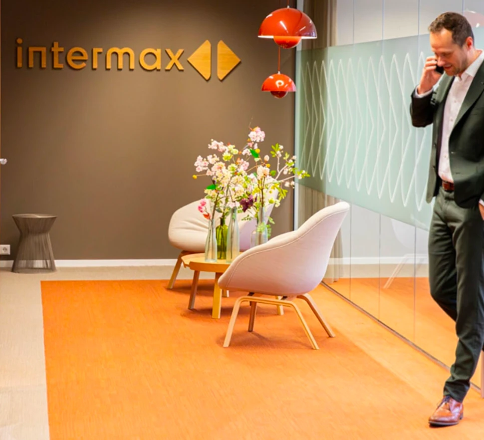 Photo of person talking on a cell phone at the Intermaxx office