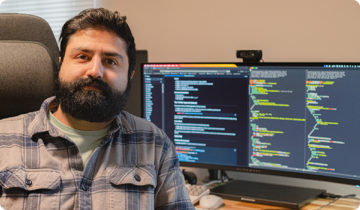 Matt Nowzari headshot next to computer screens